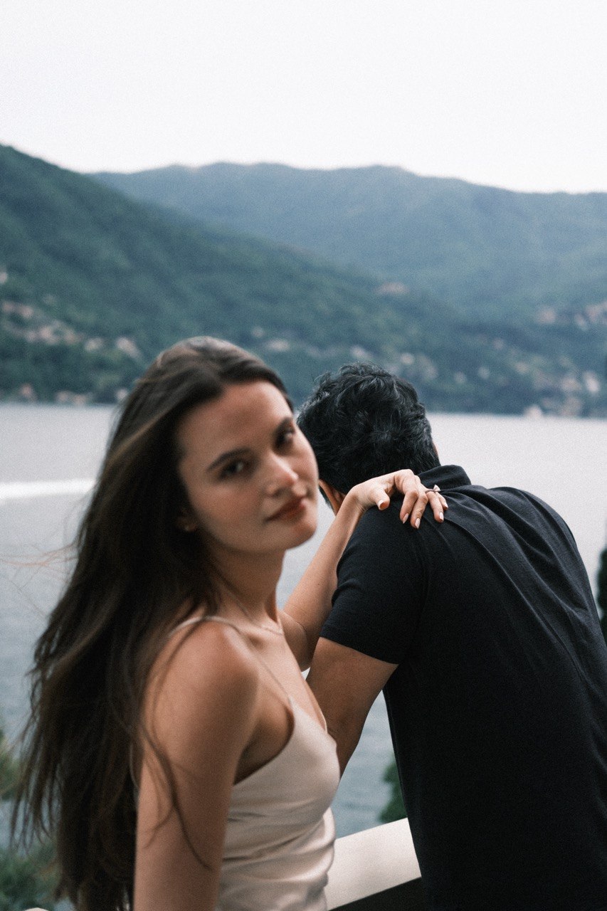 Maria & Scott sharing an intimate moment beside the lake